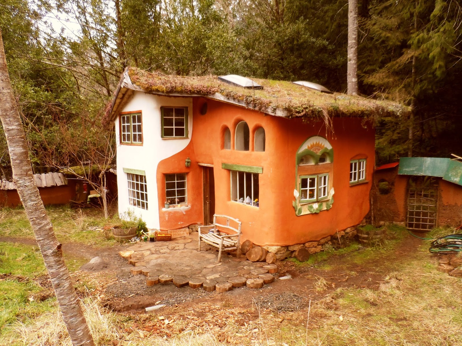 This beautiful tiny cob house on the coast in Oregon was built for very little money. It has been lovingly inhabited for several years now without the benefit of code approval. There is always a chance that houses built without approval could be condemned, but sometimes the risk is worth it.