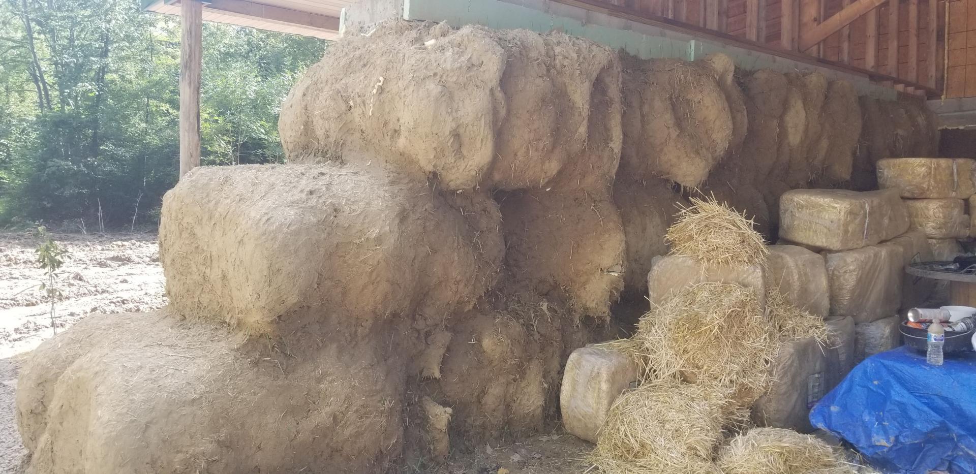 Covering the Tire Bales with Cob